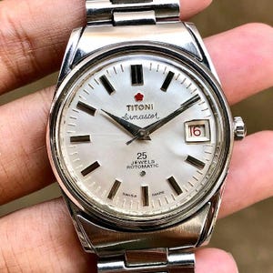 Reloj Titoni Airmaster Vintage de los años 70, automático, 25 rubíes, Rotomatic, suizo, 37 mm, esfera plateada.