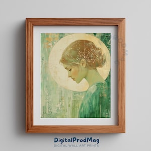 Può includere: Stampa artistica incorniciata con un ritratto sereno di una donna con un'aureola. L'opera d'arte ha una morbida tavolozza di colori verdi e oro, con il profilo della donna a fuoco. La cornice è di colore marrone caldo. Il testo "DigitalProdMag" è in basso.