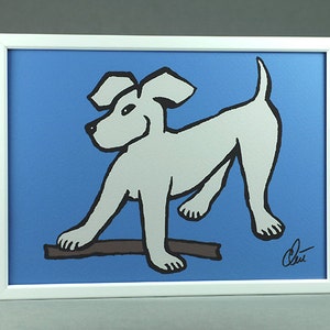 May include: A white dog with black outlines is depicted in a playful pose, holding a brown stick in its mouth. The dog is set against a bright blue background, creating a vibrant and cheerful image. The artwork is framed in white.