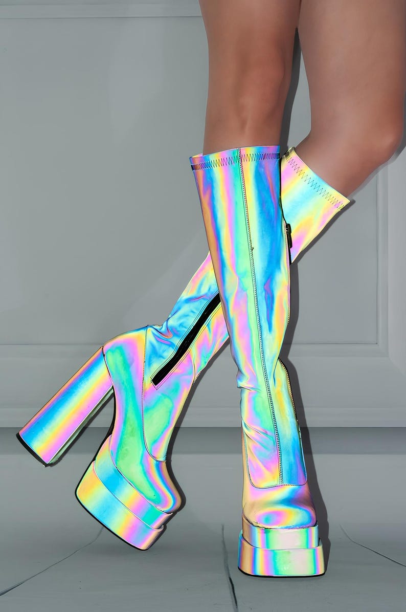 A pair of colorful, rainbow-colored platform boots with a high heel and a zipper closure.