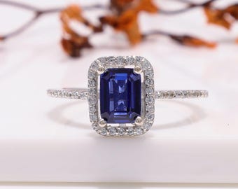 Verlobungsring mit smaragdgeschliffenem, blauem Saphir im Halo-Design, 925er Sterlingsilber, Art-Deco-Stil (7 x 5 mm)