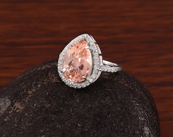 Ring mit hellorangefarbenem Padparadscha-Saphir im Birnenschliff, 925er Sterlingsilber, 14 x 10 mm Stein