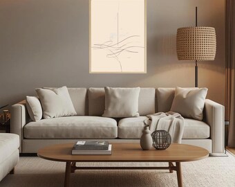 May include: A modern living room featuring a beige sofa with several pillows, a wooden coffee table, and a framed abstract art piece. A woven lamp and a neutral-toned rug complete the space.