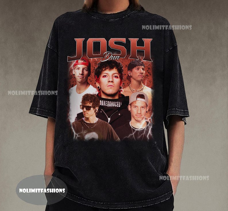 May include: Black vintage-style t-shirt featuring a graphic of the band members with the name "JOSH DUN" in red. The shirt has a distressed look and a crew neck.
