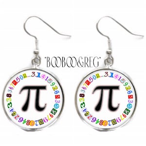 May include: A pair of silver earrings with a round white disc featuring a black pi symbol surrounded by a circle of colorful numbers. The numbers represent the digits of pi.