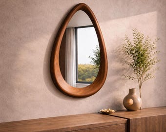 Espejo de nogal orgánico que da una cálida bienvenida a los invitados en la entrada, decoración de pared escultural y acogedora.