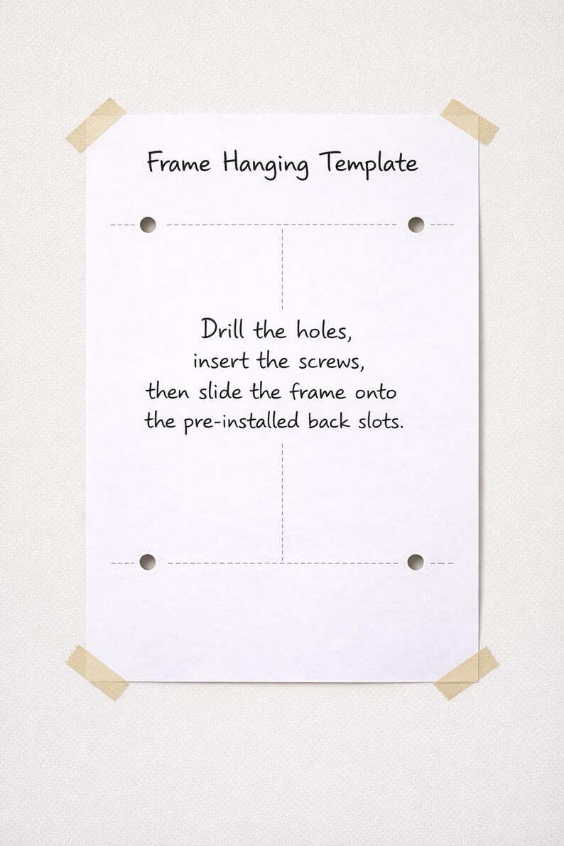 May include: A white rectangular frame hanging template paper with four circular hole markers and dashed alignment lines. The text reads: Frame Hanging Template. Drill the holes, insert the screws, then slide the frame onto the pre-installed back slots.
