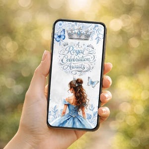 May include: A smartphone screen shows a watercolour illustration of a princess in a blue gown, a crown, and butterflies. The text "A Royal Celebration Awaits" is written in elegant script. The phone is held against a blurred green background.