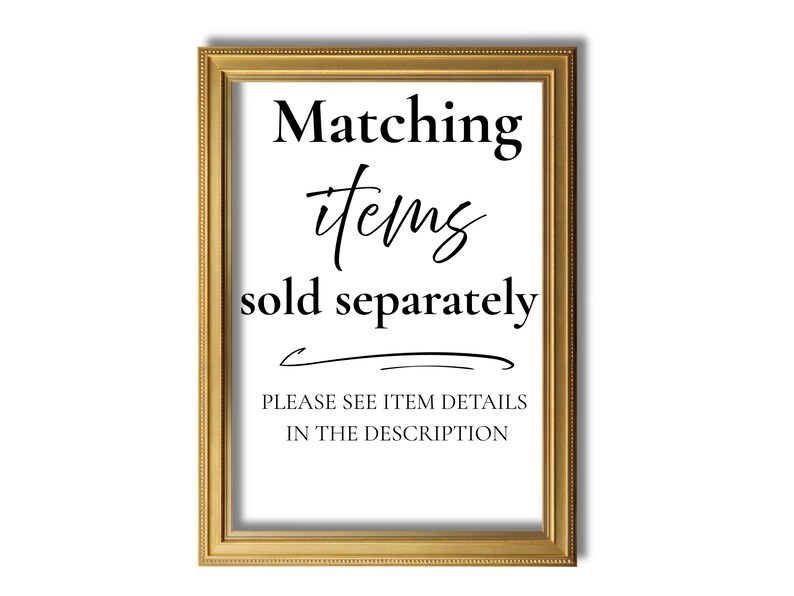 May include: A framed print with gold trim. The text on the print reads "Matching items sold separately" in a mix of fonts. Below the text is a curved line and the text "PLEASE SEE ITEM DETAILS IN THE DESCRIPTION".