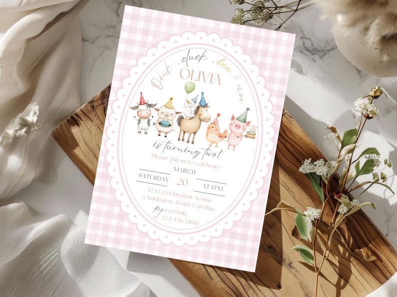 May include: Pink gingham-patterned invitation with an oval frame featuring farm animal illustrations. Text includes "Pink, duck, baa, OLIVIA is turning two!" and event details. The invitation is on a wooden surface.