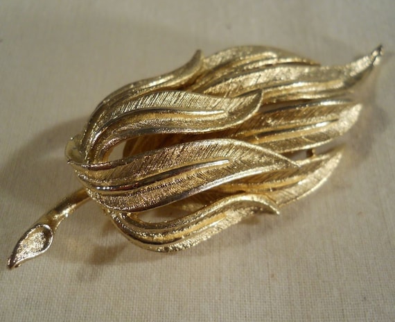 Coro brushed gold tone brooch - image 1