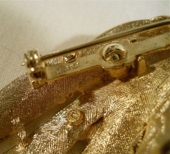 Coro brushed gold tone brooch - image 5