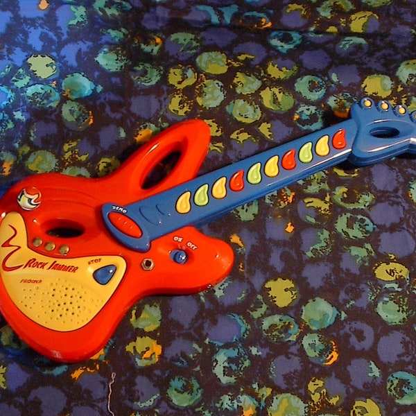 Circuit Bent Toy Guitar with pitch control and body contacts!
