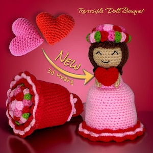 May include: A handmade crochet doll bouquet with a reversible design. The bouquet is red and white, with pink and green accents. The doll is wearing a pink dress and holding a red heart. The image also includes two crochet hearts and the text "NEW 3d Heart".