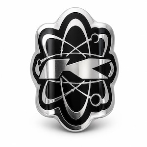May include: A decorative emblem with a black background and a silver atomic design. The emblem has a unique shape with a silver border. The design includes a stylized atom symbol and a central arrow-like shape.