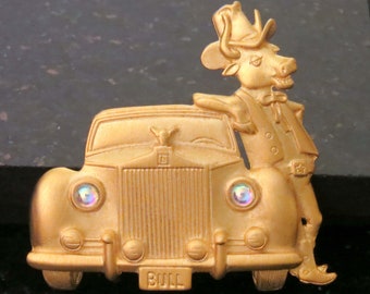 Signed and Faux Currency Rolls Royce Grill AJC Rich and Famous Matte and Shiny Goldtone Pin with Money Bag Rhinestones