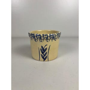 May include: A rustic wooden sign with the text "Welcome to our home" in white lettering. The sign features a distressed finish and a simple, inviting design, perfect for a front porch or entryway.