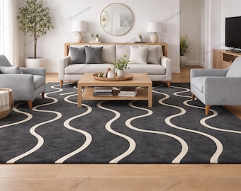 Tappeto in lana trapuntato a mano, con motivo astratto ondulato, ideale per arredamento moderno.
