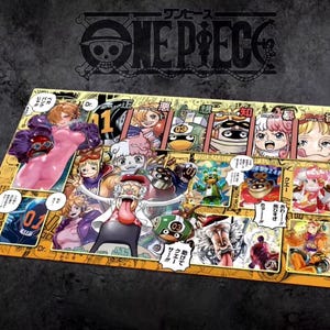 May include: A colorful One Piece-themed playmat featuring various anime characters. The playmat has a yellow background with multiple character illustrations and Japanese text. The One Piece logo is visible in the top center.