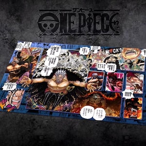 May include: A rectangular playmat featuring a One Piece manga collage with a central illustration of a muscular character with spiky hair, surrounded by various action panels, speech bubbles with Japanese text, and a dark blue patterned border.