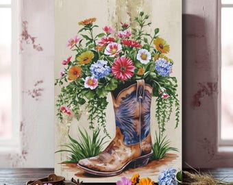 Könnte beinhalten: Ein vertikaler rechteckiger Druck, der einen braunen Leder-Cowboystiefel als Vase für einen bunten Blumenstrauß aus rosa, gelben, orangen, roten und blauen Blüten mit grünem Blattwerk zeigt. Ein Metallsporn liegt im Vordergrund auf der Oberfläche.