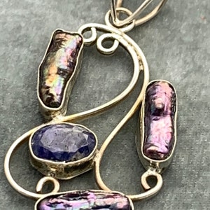 Vintage Silver pendant with biwa pearls and blue soda stone.