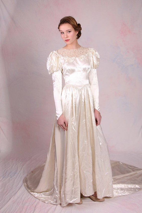 satin and lace long sleeve wedding dress