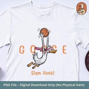 May include: White t-shirt featuring a cartoon goose with a basketball, wearing a pink headband. The word "GOOSE" is printed in orange, with "Siam Honk!" below. A small duck logo is in the upper right corner.