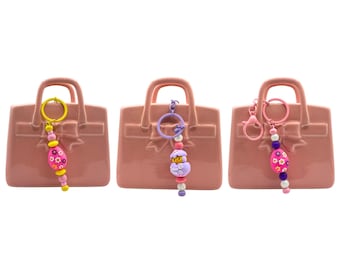 Handgefertigte / 3D gedruckte lila / rosa / gelbe OSTEREI-KÜKEN baumelnde Perlen Keychain | Erlös unterstützt die psychische Gesundheit