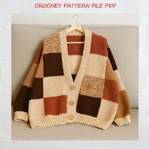May include: A patchwork crochet cardigan in shades of brown, beige, and rust, with a V-neck and wooden buttons. The text "CROCHET PATTERN FILE PDF" is at the top. The cardigan is displayed on a wooden hanger.