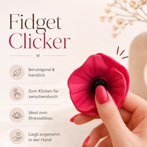 May include: A red poppy-shaped fidget clicker with a black center is held in a hand. The image includes text that reads "Fidget Clicker" and other text in German. The fidget toy is designed for stress relief and is easy to handle.