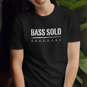Black t-shirt with "BASS SOLO" and repeated "E" on the chest.