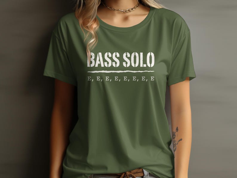 Olive green t-shirt with white "BASS SOLO" and repeated "E" text.
