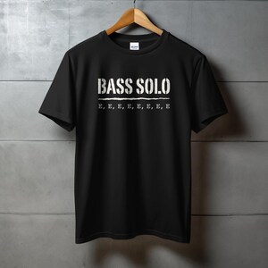 Black t-shirt with "BASS SOLO" and "E, E, E, E, E, E, E, E" text.
