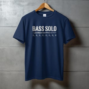 Navy t-shirt with "BASS SOLO" and repeating "E" text.