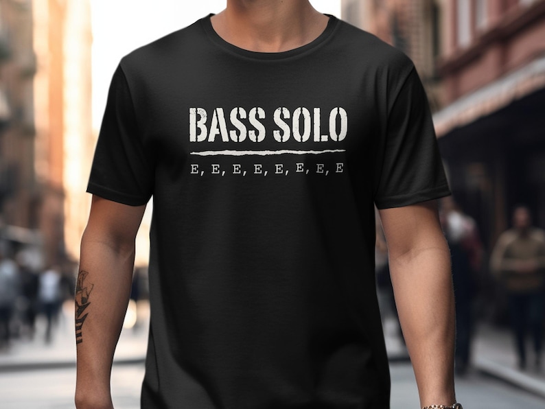 Black t-shirt with "BASS SOLO" and repeated "E" text graphics.