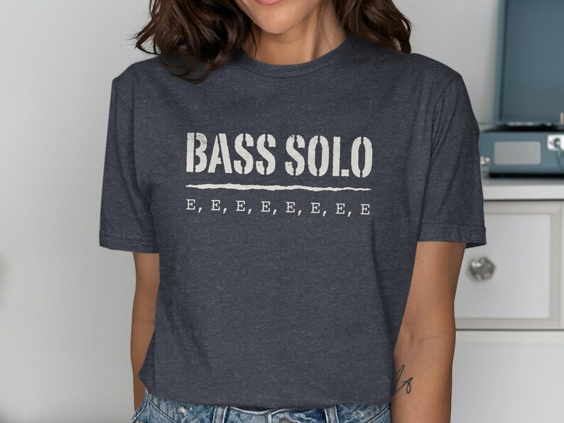 Dark grey t-shirt with "BASS SOLO" and repeated "E"s printed on the front.