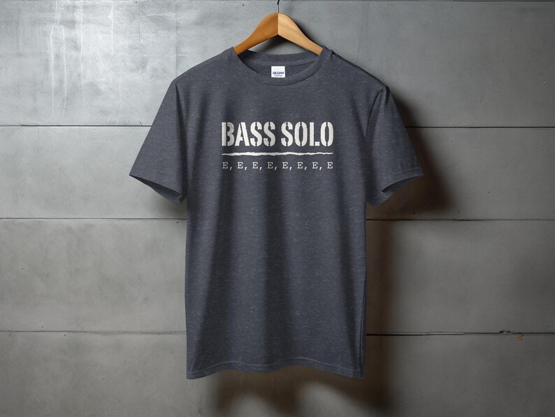 Dark grey t-shirt with "BASS SOLO" and repeated "E"s printed on chest.