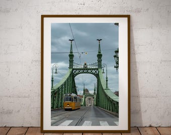 Yellow Tram on Liberty Bridge in Budapest, Hungary