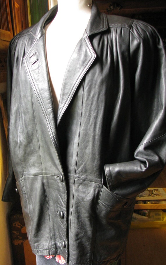 1980's Avant Garde mid length leather coat. dolman-sleeved  dropped shoulders black leather jacket. medium