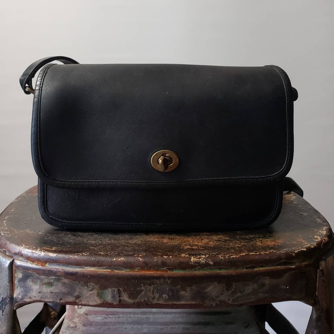 COACH Flap Bag, 1970s in Black Leather 2/3 Flap With Oval Brass Turn