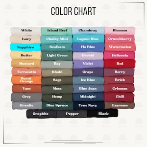 May include: A color chart displaying a grid of folded fabric swatches in various shades. The text "COLOR CHART" appears at the top. The swatches are labeled with names including White, Ivory, Sapphire, Butter, Mustard, Terracotta, Burnt Orange, Yam, Grey, Granite, Island Reef, Chalky Mint, Seafoam, Light Green, Bay, Khaki, Sage, Moss, Hemp, Blue Spruce, Graphite, Pepper, Chambray, Lagoon Blue, Flo Blue, Orchid, Violet, Grape, Ice Blue, Blue Jean, Midnight, True Navy, Blossom, Crunchberry, Watermelon, Heliconia, Red, Berry, Brick, Crimson, Chili, Espresso, and Black.