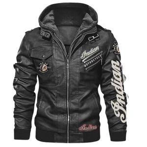 May include: Black leather motorcycle jacket with a grey hooded lining. The jacket features the words "Indian Motorcycle" in white script on the chest and sleeve, along with patches. It has a zip-up front, multiple pockets, and a ribbed hem.
