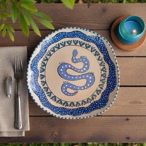 Handmade Ceramic Plate with Blue Snake Motif – Mystical Symbolism