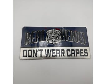 Open Road Brands Real Heroes Don't Wear Capes Police Metal Sign 12x6 New