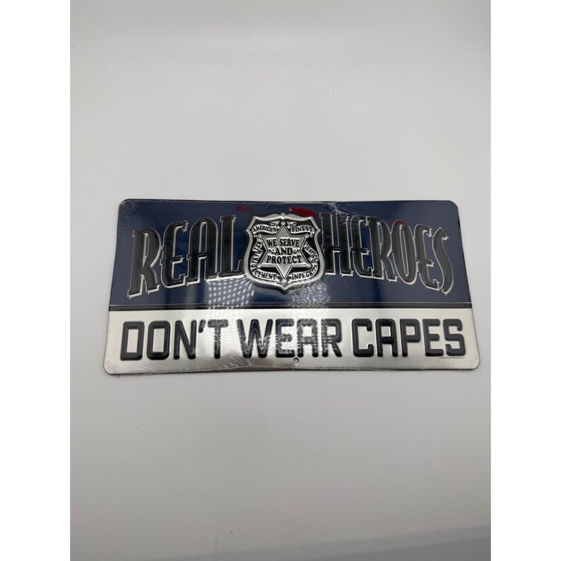 Open Road Brands Real Heroes Don't Wear Capes Police Metal Sign 12x6 New image 1