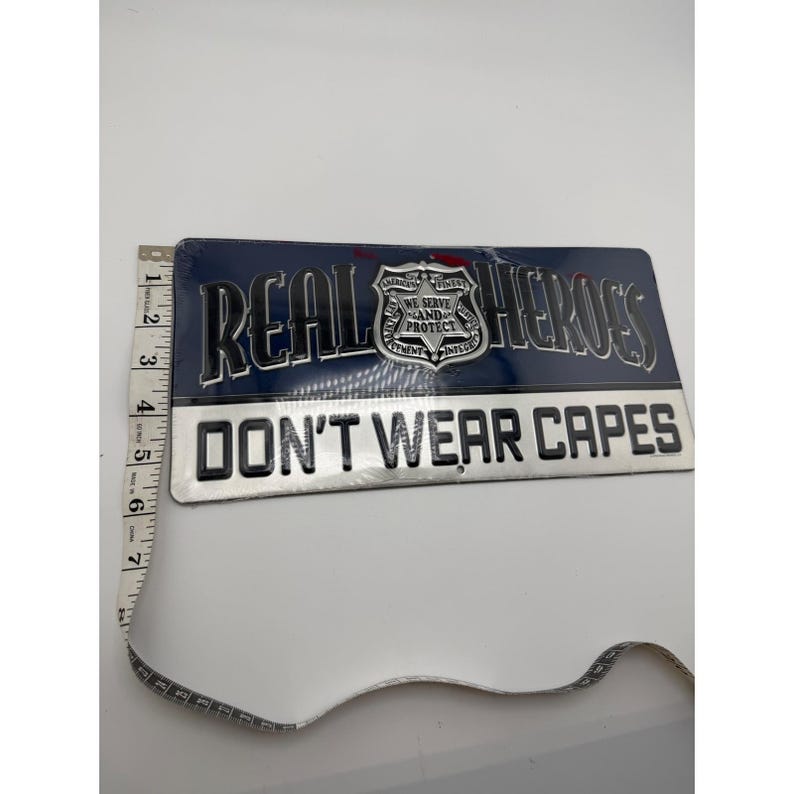 Open Road Brands Real Heroes Don't Wear Capes Police Metal Sign 12x6 New image 4