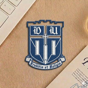 May include: A set of three ceramic mugs with a speckled, matte finish. The mugs are in shades of cream, light gray, and dark gray. Each mug has a simple, minimalist design and a rounded handle.