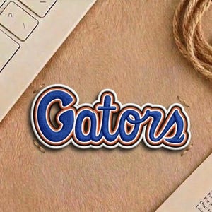 Florida Gators Word Logo Patch - UF University Embroidered Emblem for Jackets, Orange and Blue College Spirit DIY, Iron on, Sew on