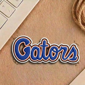 May include: A white ceramic mug with a black handle and the text "But First, Coffee" in a handwritten style. The mug is likely 11-15 ounces, perfect for a morning beverage.